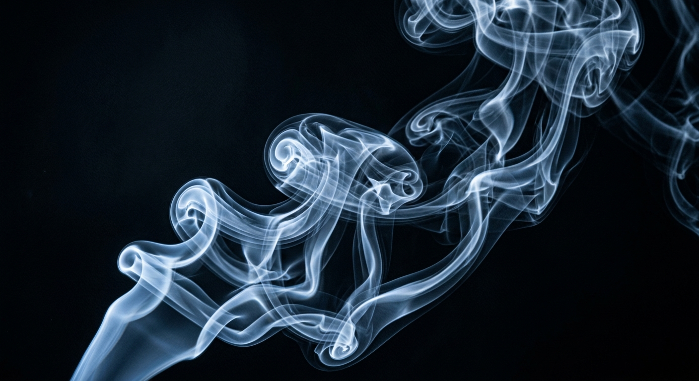 Cool blue-white vapor drifting against near-black — the vape wall's atmosphere